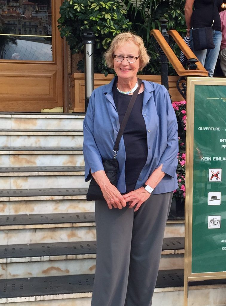 Photo of Ann Bohlke in front of steps. 