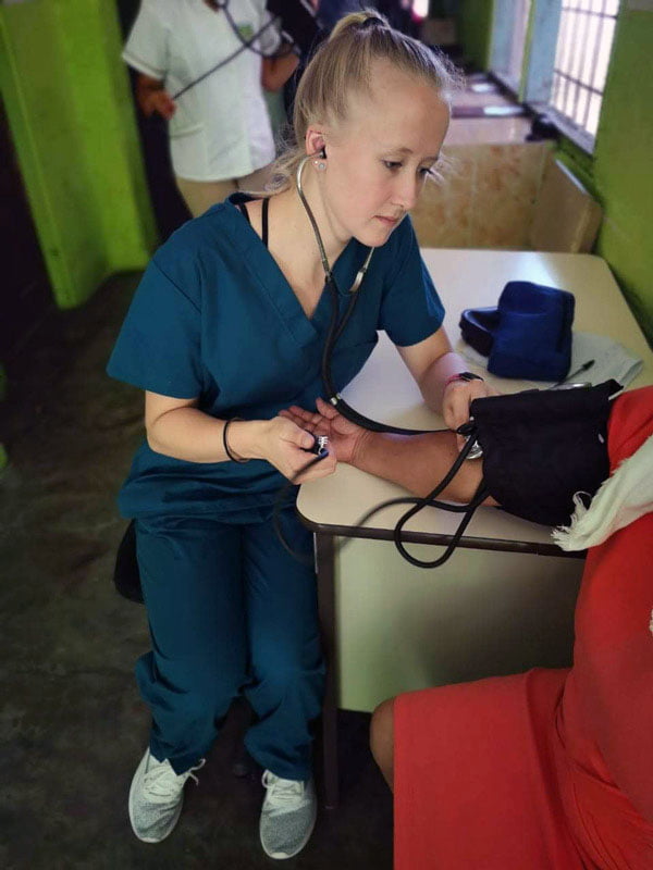 Camilla-Lee-20 Camilla Lee taking blood pressure of patient