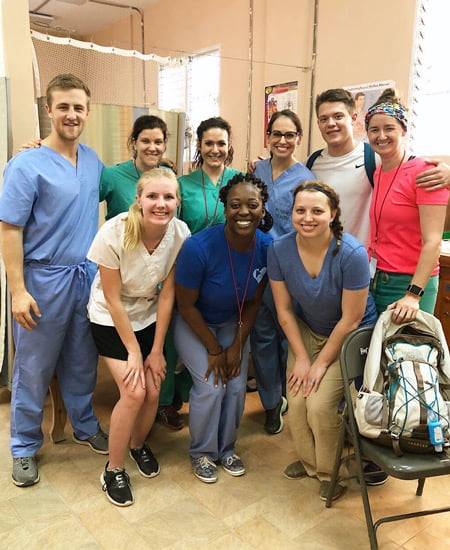 Emma Johnson and clinicians in Haiti