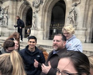 News 1 Group of students on steps in front of Paris Opera house.