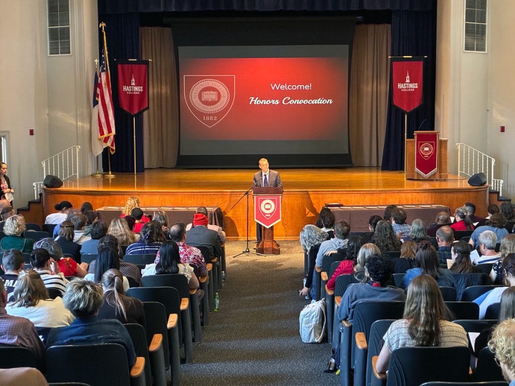 Honors Convocation stage with Dr. Wayne Riggs