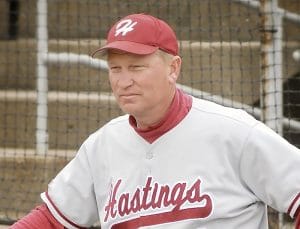 Alumni Stories 2 Jim Boeve in a Hastings baseball jersey and cap.