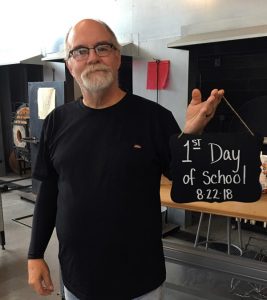 Photo of Tom Kreager in the glass studio