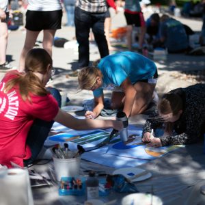 Students painting a mural