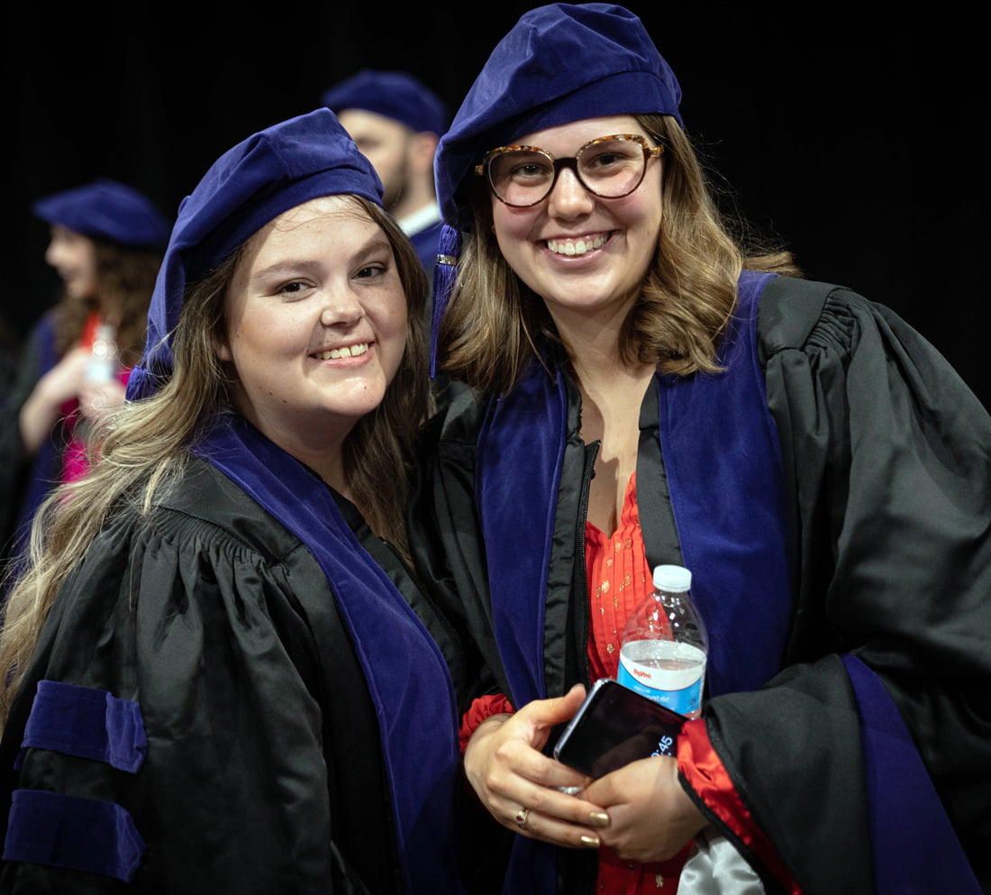 VictoriaHervey-NatalieHoffmann_23w Victoria Hervey ‘18 and Natalie Hoffmann ‘19 at their law school graduation in May 2022. While following different paths, the two now work together at Lindemeier Law Office in North Platte, Nebraska.