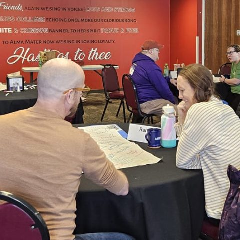 Members of the ASPIRE Faith Advisory Council brainstorm during a session.