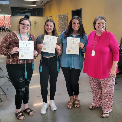 New members of Alpha Kappa Delta include (from left) Aislynn Davis, Gabriella Vinciguerra and Lauryn Metz. They are joined by sociology faculty advisor Dr. Laura Logan. (Not pictured: Courtney Manahan and Amani Monroe.)