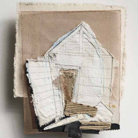 Textile artwork that looks like a house