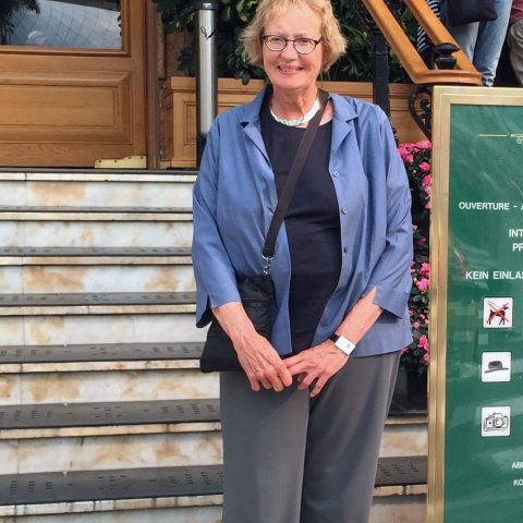Photo of Ann Bohlke in front of steps.