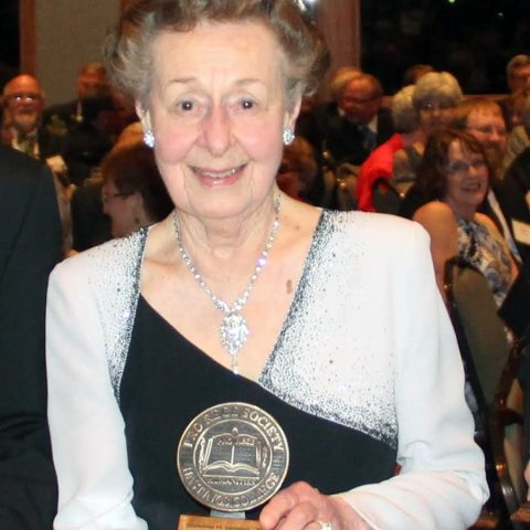 Gretchen (Holeman) Lainson with her Pro Rege award in April 2014.