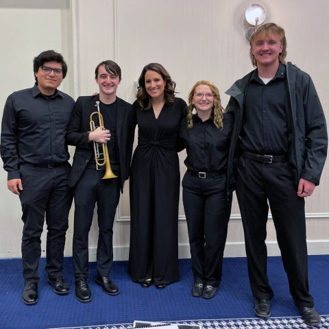 Hastings College students with Dr. Patricia Cornett, clinician of the Nebraska Intercollegiate Band. From left: Erick Rodriguez, Jake Darling, Cornett, Alana DeBellis and Karl Ludwig.