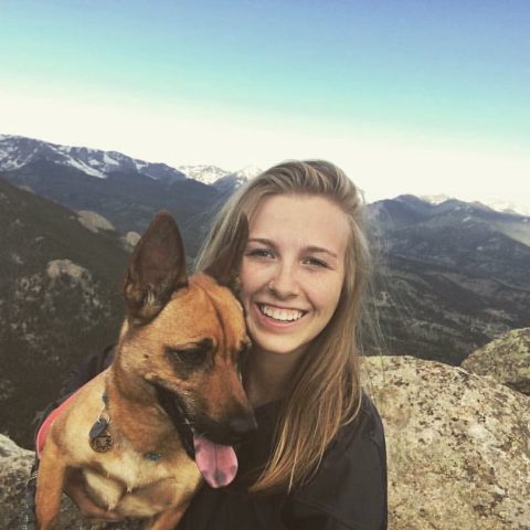 Photo of a woman and her dog near Estes Park, Colorado.