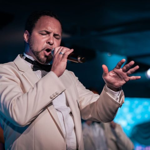 Dustin Kerr '11 performing on board a cruise ship.