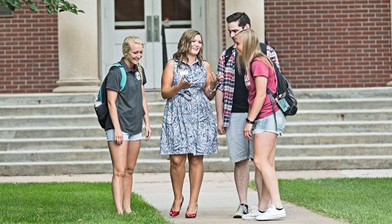 LandThumb_Admissions_4 Students working with an admissions counselor