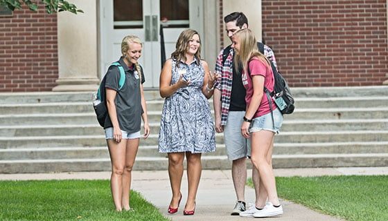 LandThumb_Admissions_4 Students working with an admissions counselor
