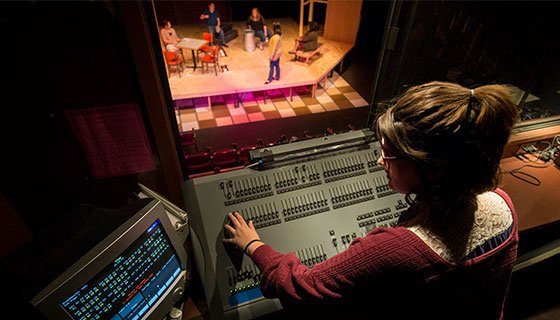 LandThumb_Arts1 Student working in the control room at Scott Studio Theatre