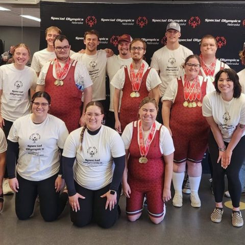Hastings College student coaches and the Special Olympics powerlifting team. Front (from left): Aaron Bieck, Emma Luna, Morgan Arias, Ella Shaw; Middle (from left): Reagan Bartley, Moyer Reiners, Levi Hoaglund, Sherry Gray, Breanna Jonaitis; Back (from left): Ben Seymour, Marcus Dustin, Brock Buresh, Hudson Devlin, Nick Wahlmeir, Micah Kiehl; Not pictured: Jenna Sterling, Dr. Matthew Beeler