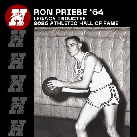 Photo of Ron Priebe with a basketball.