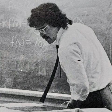 Schneider in a classroom on campus in 1987.