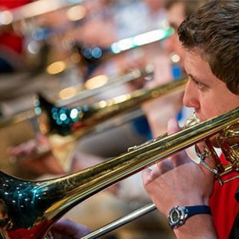 Picture of students playing trombones.