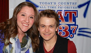 Hastings College student Lauren Sawyer with Grammy-nominated country star Hunter Hayes. Sawyer met Hayes during her internship with Clear Channel.