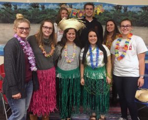 Picture of several college students in luau apparel.