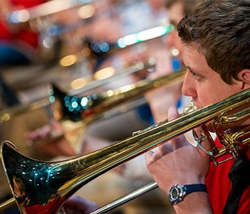 Picture of students playing trombones.